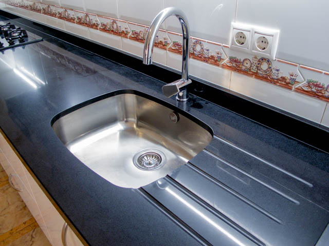 Bright and modern kitchen – Sink under worktop and tap